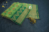 KST7133 Leaf Green Pochampally Silk-Cotton saree featuring ikat-style buttas.