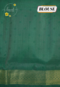 KST7133 Leaf Green Pochampally Silk-Cotton saree featuring ikat-style buttas.