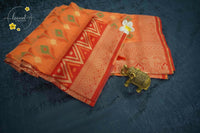 KST7136 Orange Pochampally Silk-Cotton saree featuring ikat-style buttas.