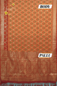 KST7136 Orange Pochampally Silk-Cotton saree featuring ikat-style buttas.