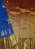 LSK6115 Royal Blue silk saree with gold motifs contrasted by a maroon pallu and border with golden zari.