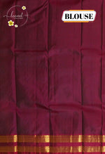 LSK6116 Olive green silk saree with contrasting maroon borders and pallu, densely woven with intricate gold zari patterns.