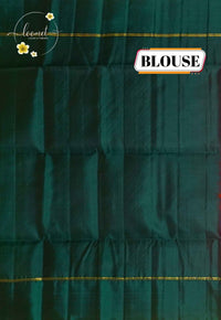 LSK6117 Rani Pink silk saree with delicate woven dots contrasted by a rich, textured  green pallu and border.
