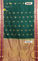 LSK6118 Emerald Green silk saree with small gold brocade motifs, featuring a striking maroon pallu and border.