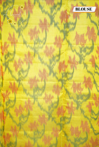 LSK6120 Royal purple and lemon-yellow silk saree with white floral motifs, dramatically contrasted by a yellow pallu featuring bold floral brocade.