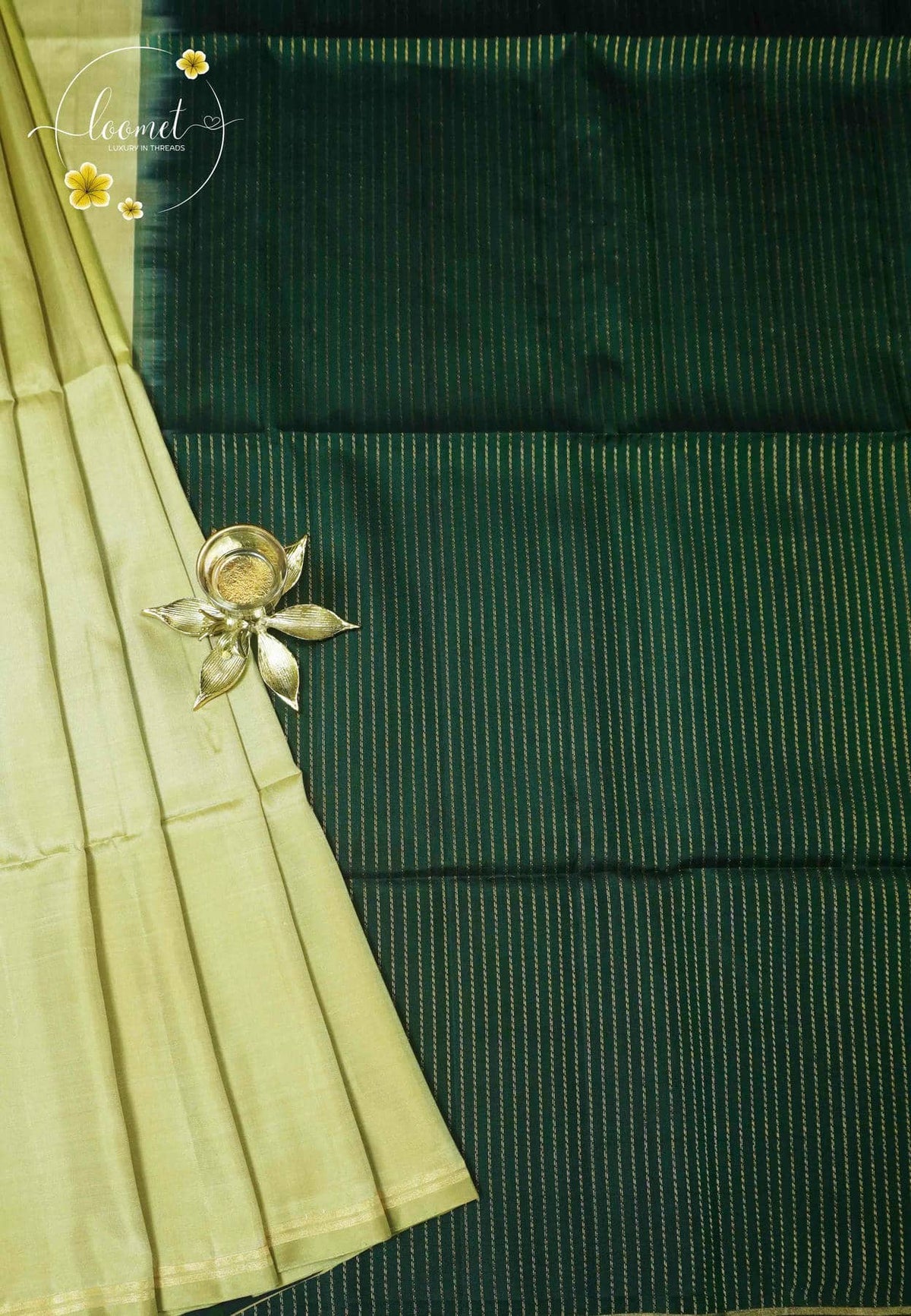 LSK6121 Light sage green and forest green silk with a richly woven green pallu featuring fine vertical zari stripes.