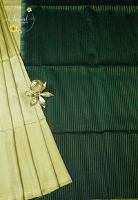 LSK6121 Light sage green and forest green silk with a richly woven green pallu featuring fine vertical zari stripes.