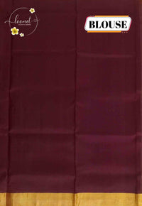 LSK6122 Cream and maroon silk saree contrasted by a dense maroon pallu woven with intricate gold geometric patterns.