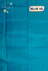 LSK6123 Royal purple and aqua blue silk saree with gold motifs, dramatically contrasting a shimmering blue pallu with intricate woven patterns.