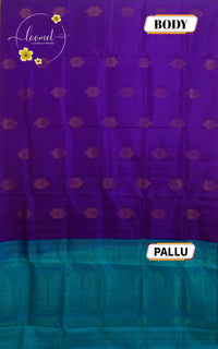 LSK6123 Royal purple and aqua blue silk saree with gold motifs, dramatically contrasting a shimmering blue pallu with intricate woven patterns.