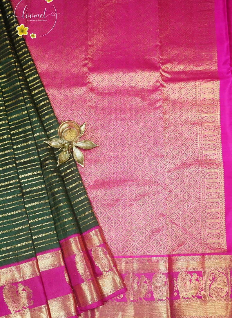 LSK6128 Forest Green and Rani Pink contrast silk saree with gold zari and peacock design on border.