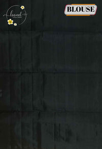 LSK6130 Silver-Grey silk saree with black pallu richly woven with large, intricate silver zari peacock motifs.