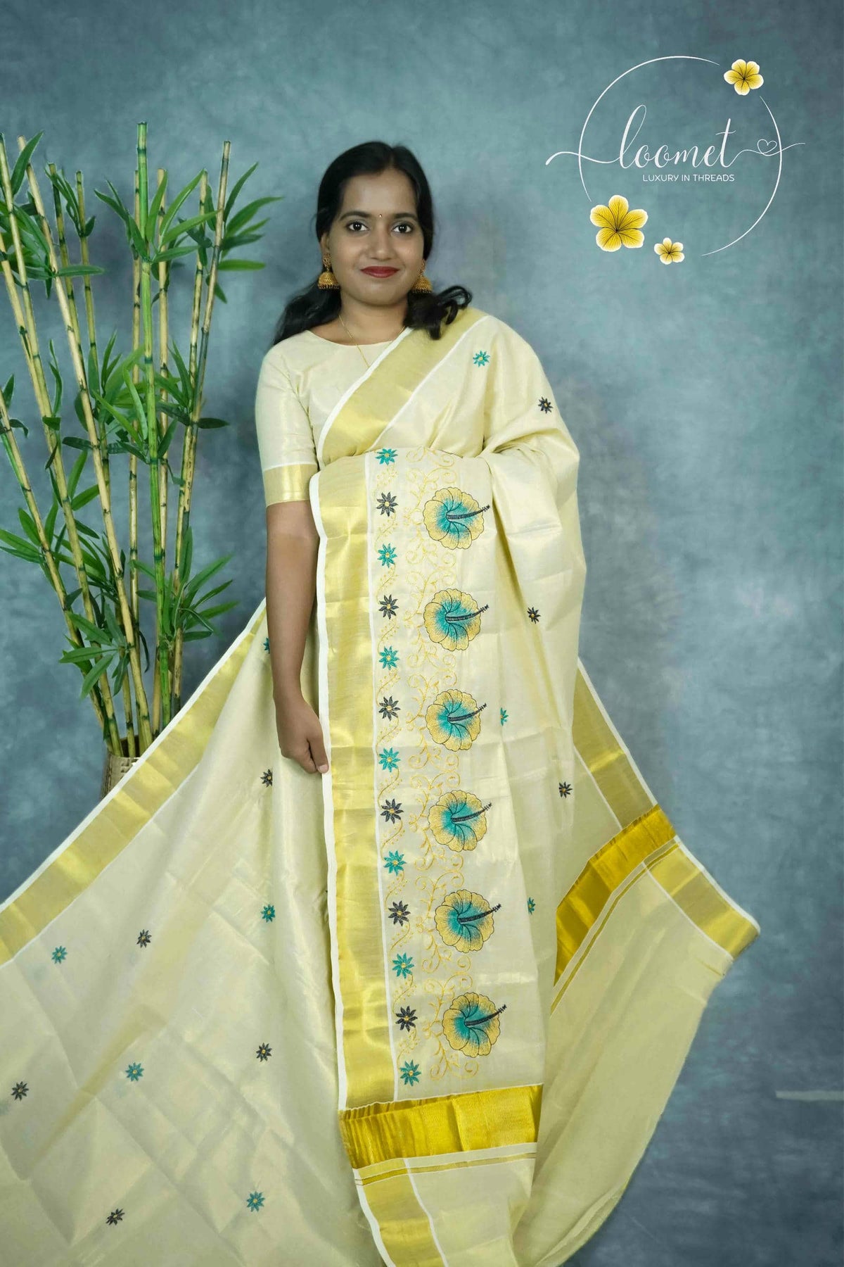 MKF3260 Light Gold Cotton Tissue saree with Embroidered Hibiscus Motifs