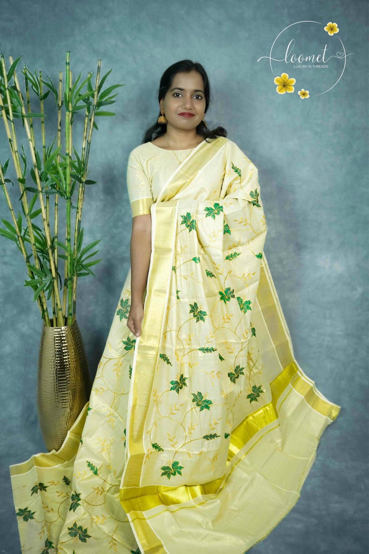MKF3262 Light Gold Cotton Tissue saree with Leaf Buttas.