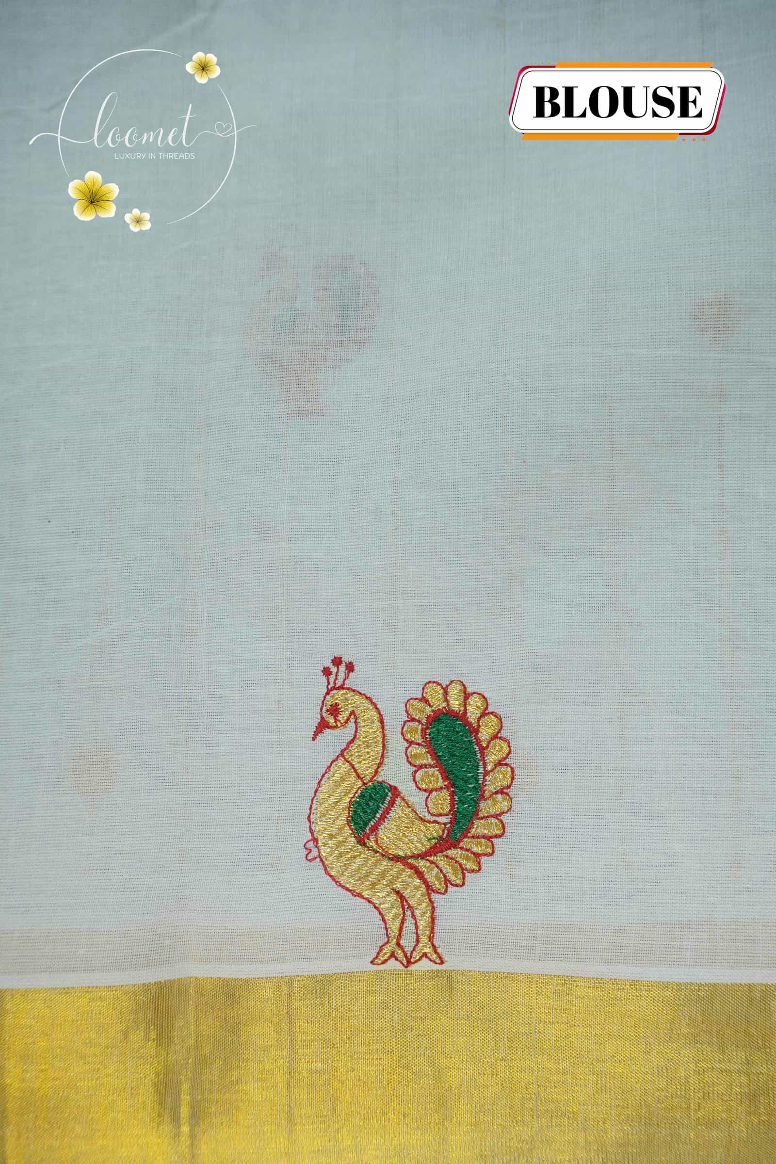 MKF3270 White saree features a golden zari border and horizontal lines adorned with small peacock and floral embroidery.