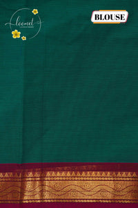 MPS1650 Emerald Green Kanchi cotton saree with gold zari buttas and wavy pattern.