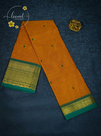 MPS1651 Yellow-Gold Kanchi cotton saree with gold zari buttas and wavy pattern.