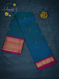 MPS1652 Teal Blue Kanchi cotton saree with gold zari buttas and wavy pattern.
