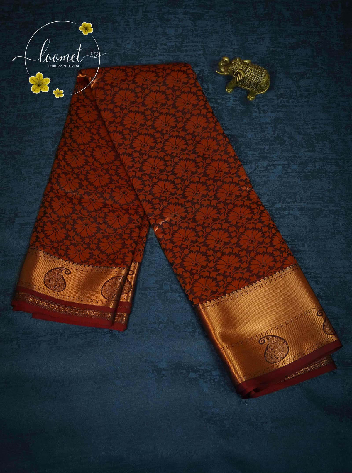 MPS2651 Deep Russet Red semi soft silk saree with all-over jacquard weave & leaf-drop motifs.