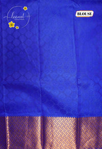 MPS2657 Leaf Green semi soft silk saree with all-over jacquard weave & paisley buttas.