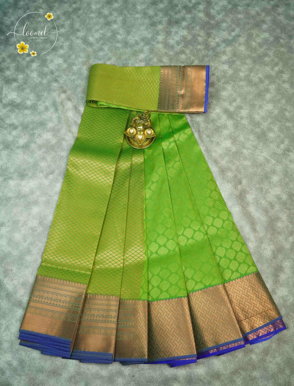 MPS2657 Leaf Green semi soft silk saree with all-over jacquard weave & paisley buttas.