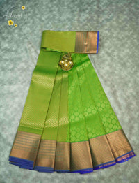 MPS2657 Leaf Green semi soft silk saree with all-over jacquard weave & paisley buttas.