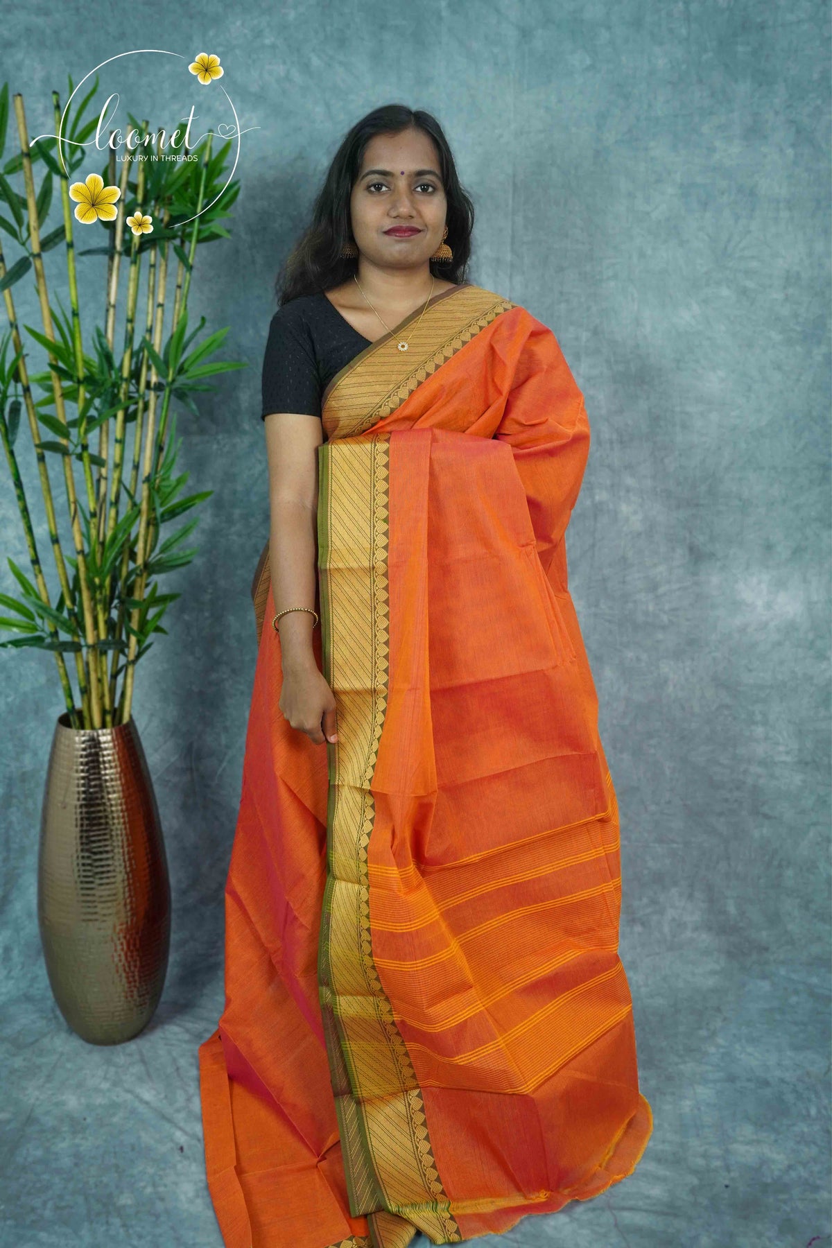 NKS1040 Orange Handloom Cotton saree with plain body pattern.