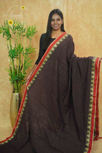 NLS1080 Deep coffee brown Handloom Cotton saree with featuring a red temple border.