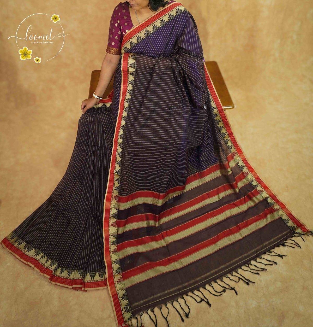 NLS1081 Navy blue Handloom Cotton saree with featuring a red temple border.
