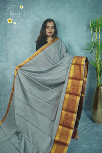 NLS1117 Stone Grey Handloom Cotton saree with plain body pattern.
