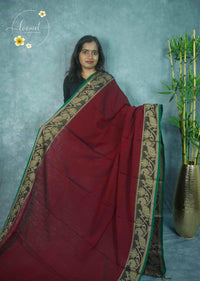 NLS1121 Maroon Handloom Cotton saree with  Floral and Peacock vine motifs