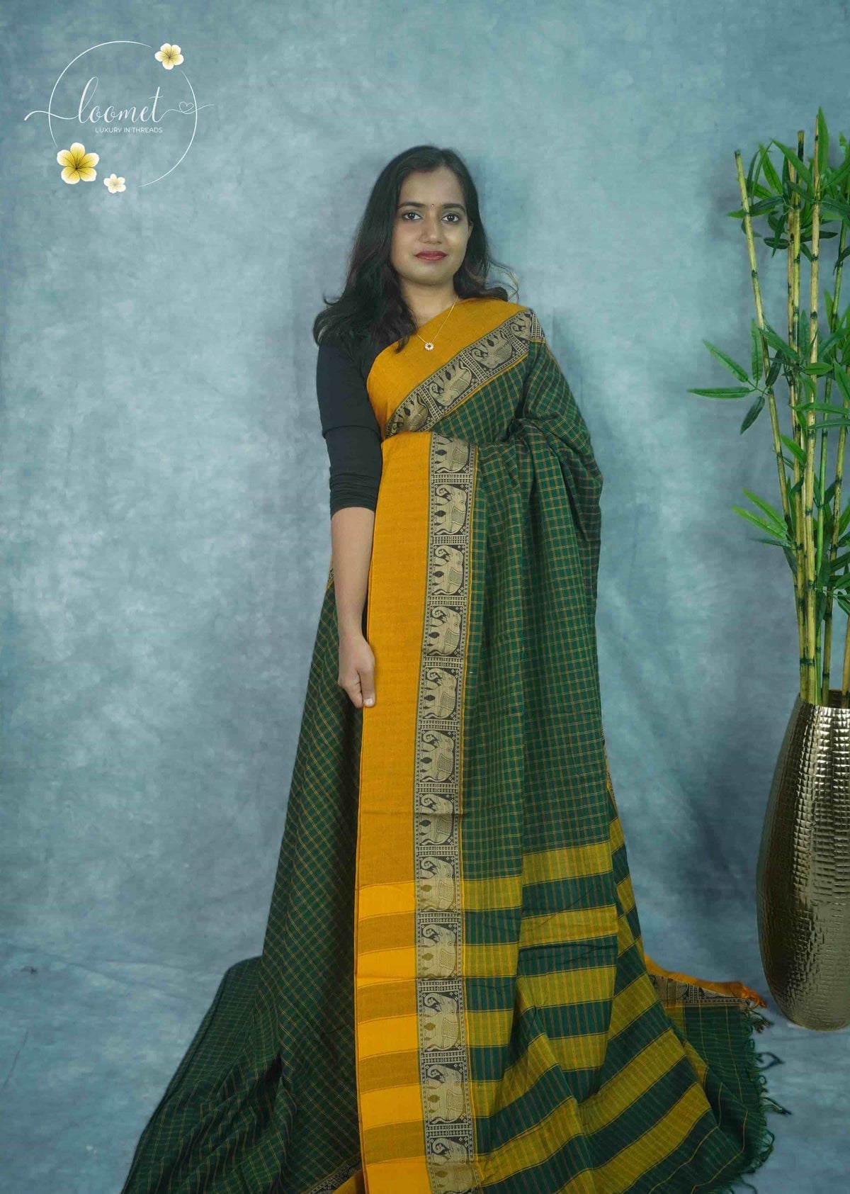 NLS1125 Green Handloom Cotton saree with checked pattern.