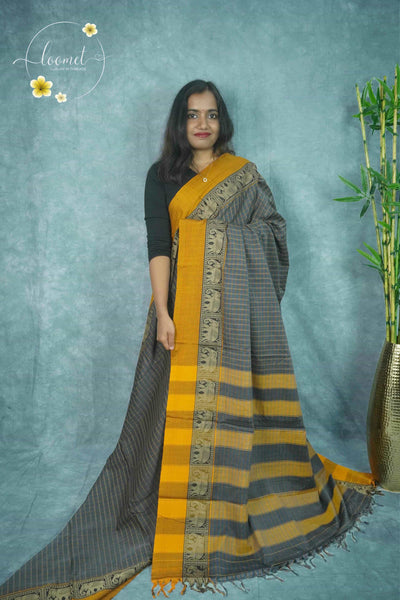 NLS1126 Grey checked body paired with a mustard yellow border showcasing intricate elephant motifs.