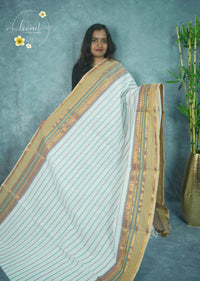 NLS5211 White Handloom Cotton saree with diagonal wavy stripes.