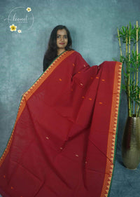 NLS5311 Crimson Red Handloom Cotton saree with small floral buttas.