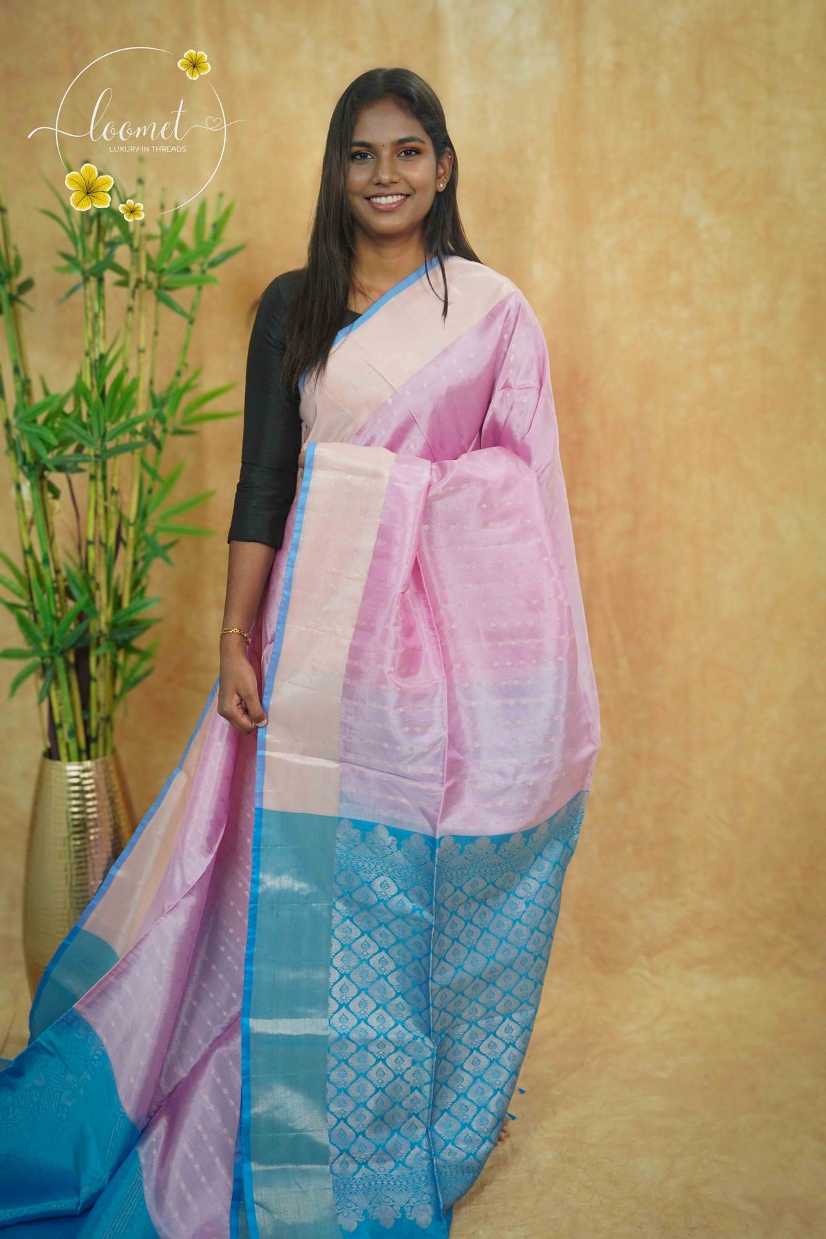 PSS5131 Baby Pink semi soft silk saree with silver zari buttas.