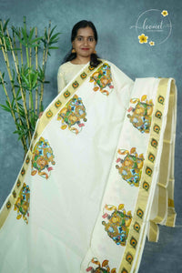 RDT2411 Off-White Kerala Kasavu Kuthampully Cotton saree with mural art prints of Radha-Krishna motifs.
