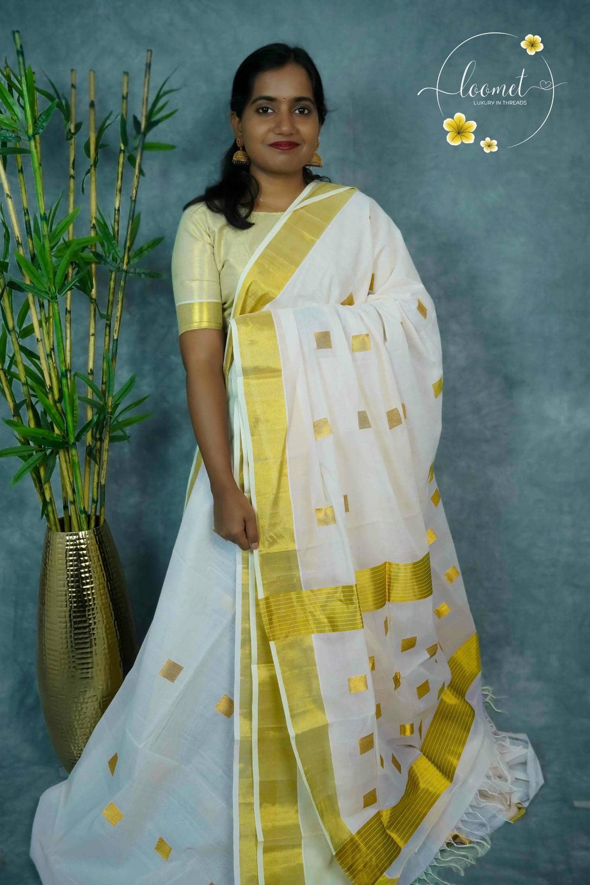 RDT2511 Kuthampully Handloom Off-white Cotton saree with Solid Square Buttas