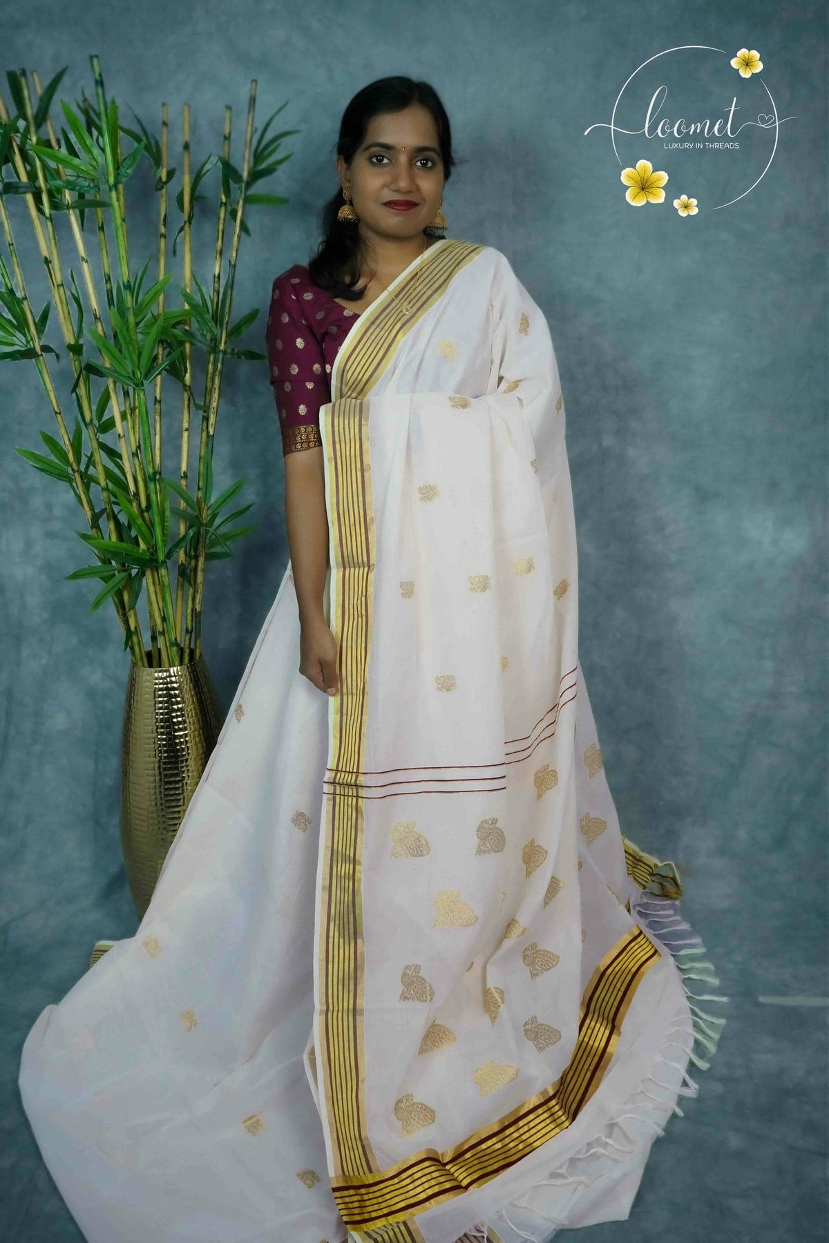 RDT2811 Kuthampully Handloom Off-white Cotton saree with annapakshi and peacock motifs.