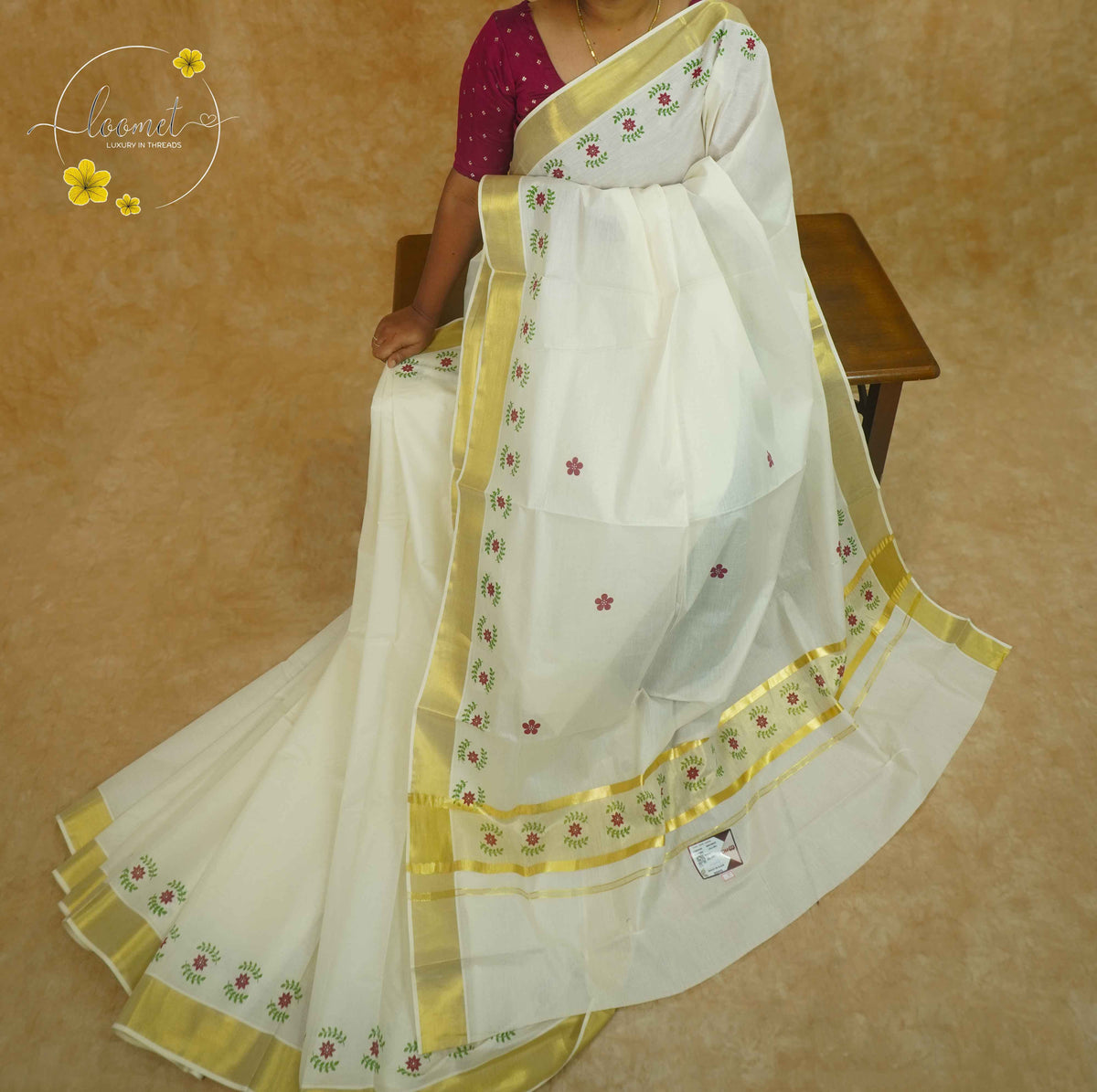 RKT2151 Off-White Kerala Cotton saree with hand-block printed floral vines and golden kasavu border.