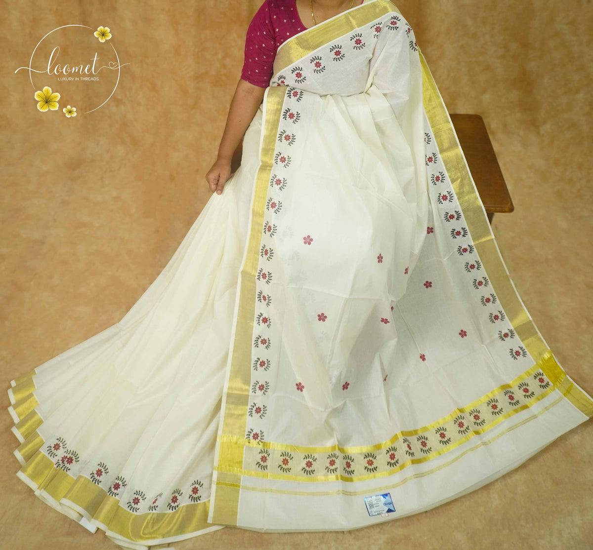 RKT2152 Off-White Kerala Cotton saree with hand-block printed floral vines and golden kasavu border.