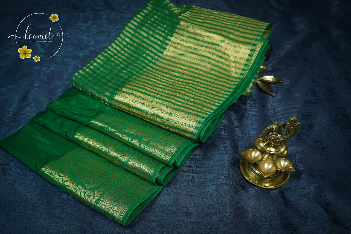 RS1612 Emerald Green Matka silk saree with floral and paisley circular motifs.