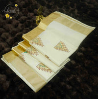 SDS1501 Off-White Kerala Cotton saree with golden kasavu border and temple spire buttas.