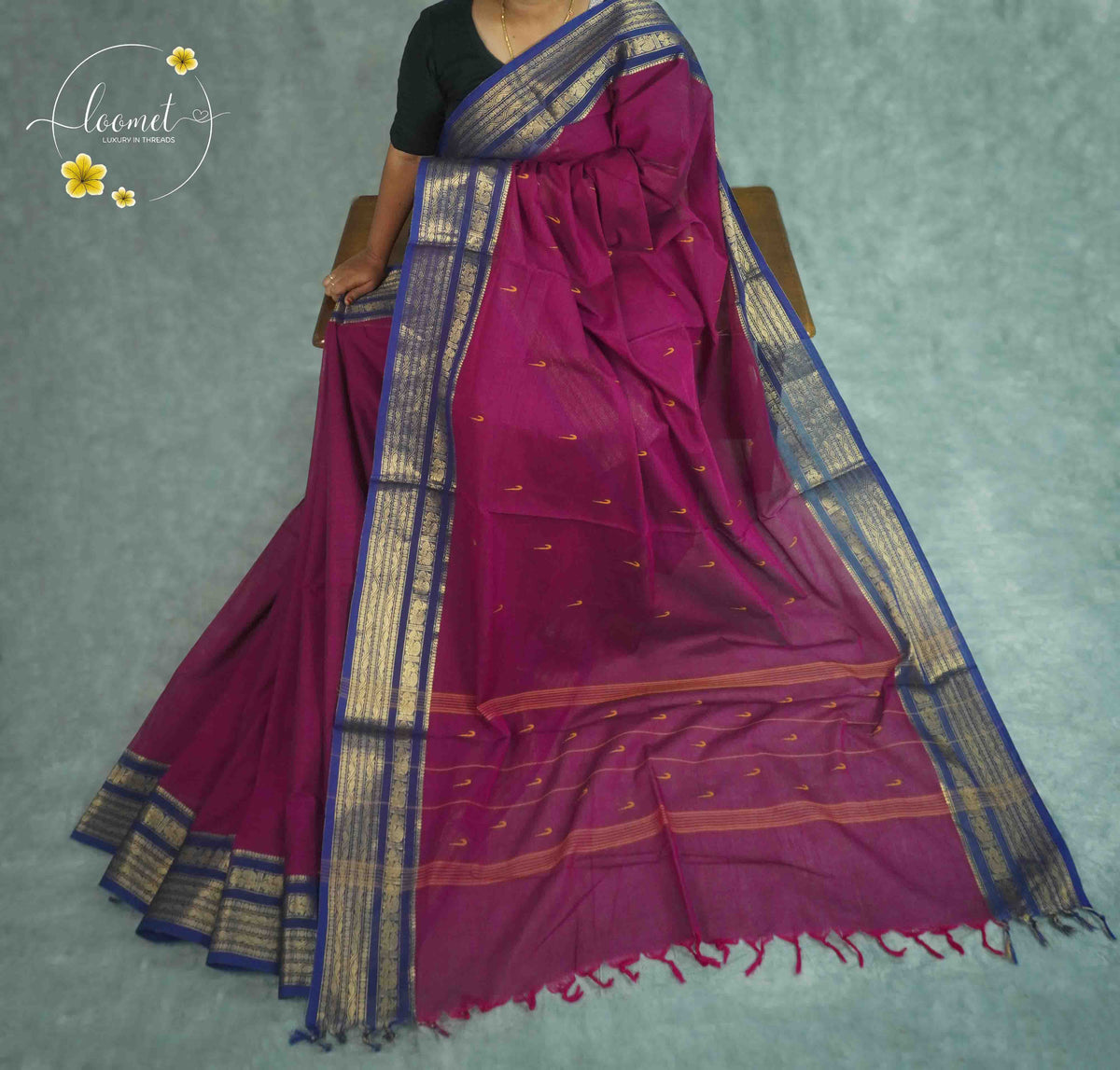 SKV1732 Magenta Cotton saree featuring rich blue and gold zari borders.