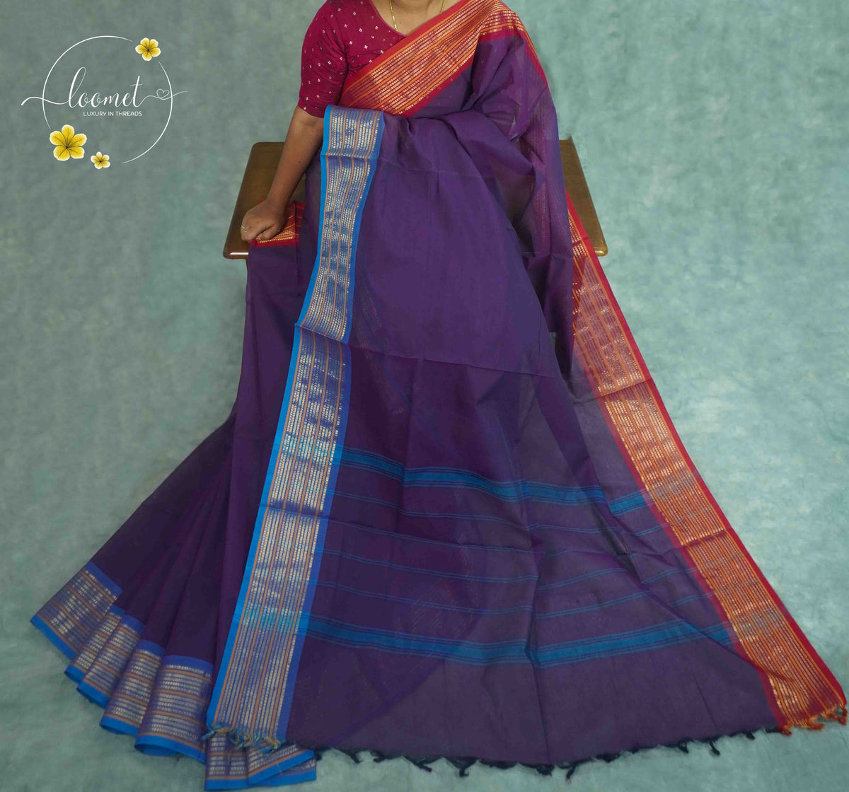 SKV2312 Deep purple Cotton saree featuring blue and red zari woven borders.