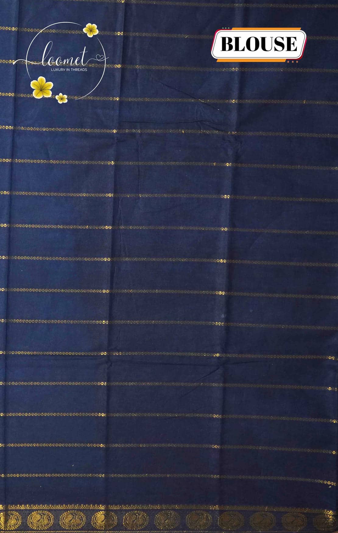 SPT3143 Sky blue saree with horizontal gold zari stripes on the body with antique gold brocade peacock motifs on a solid navy blue base.