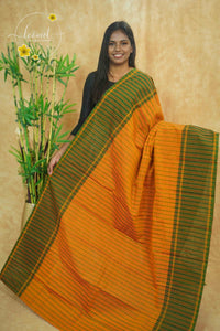 SSK1030 Mustard Yellow and Forest Green Cotton saree with Checked and Striped pattern.