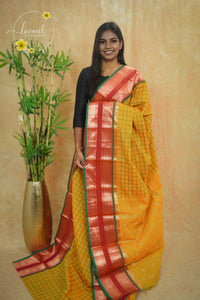 SSK1040 Mustard Yellow Handloom Cotton saree with green windowpane grid (checks) pattern.