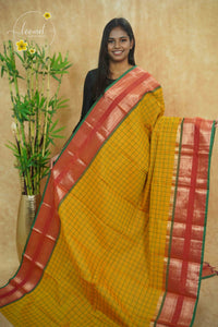 SSK1040 Mustard Yellow Handloom Cotton saree with green windowpane grid (checks) pattern.