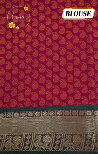 SSK1050 Magenta Cotton saree with self-jacquard peacock motifs.